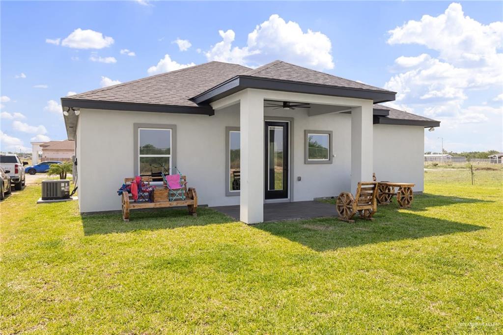7710 Navel Lane Mission, TX 78574 - Photo 2 of 20 a view of a house with swimming pool and sitting area