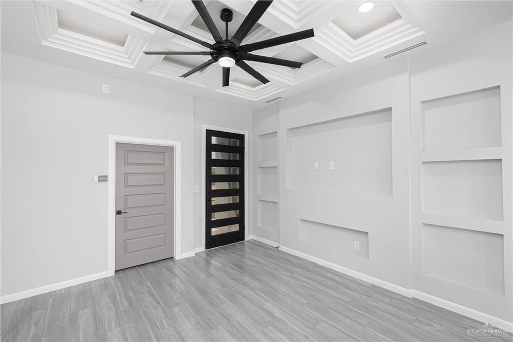 7710 Navel Lane Mission, TX 78574 - Photo 4 of 20 wooden floor in an empty room