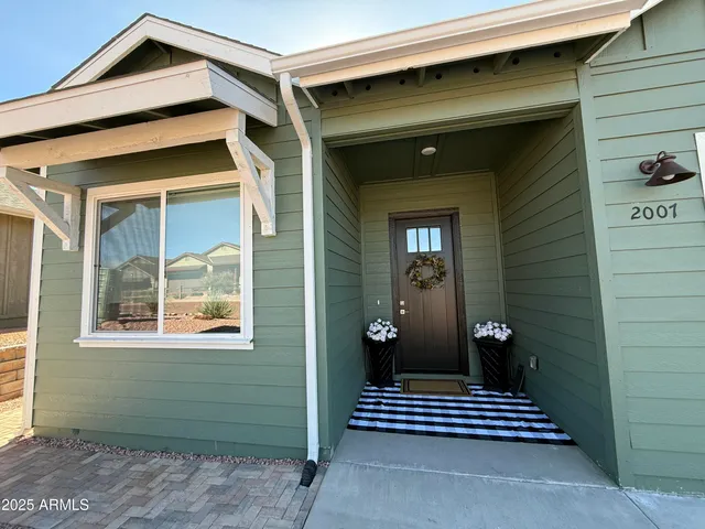 a view of outdoor space and wooden deck
