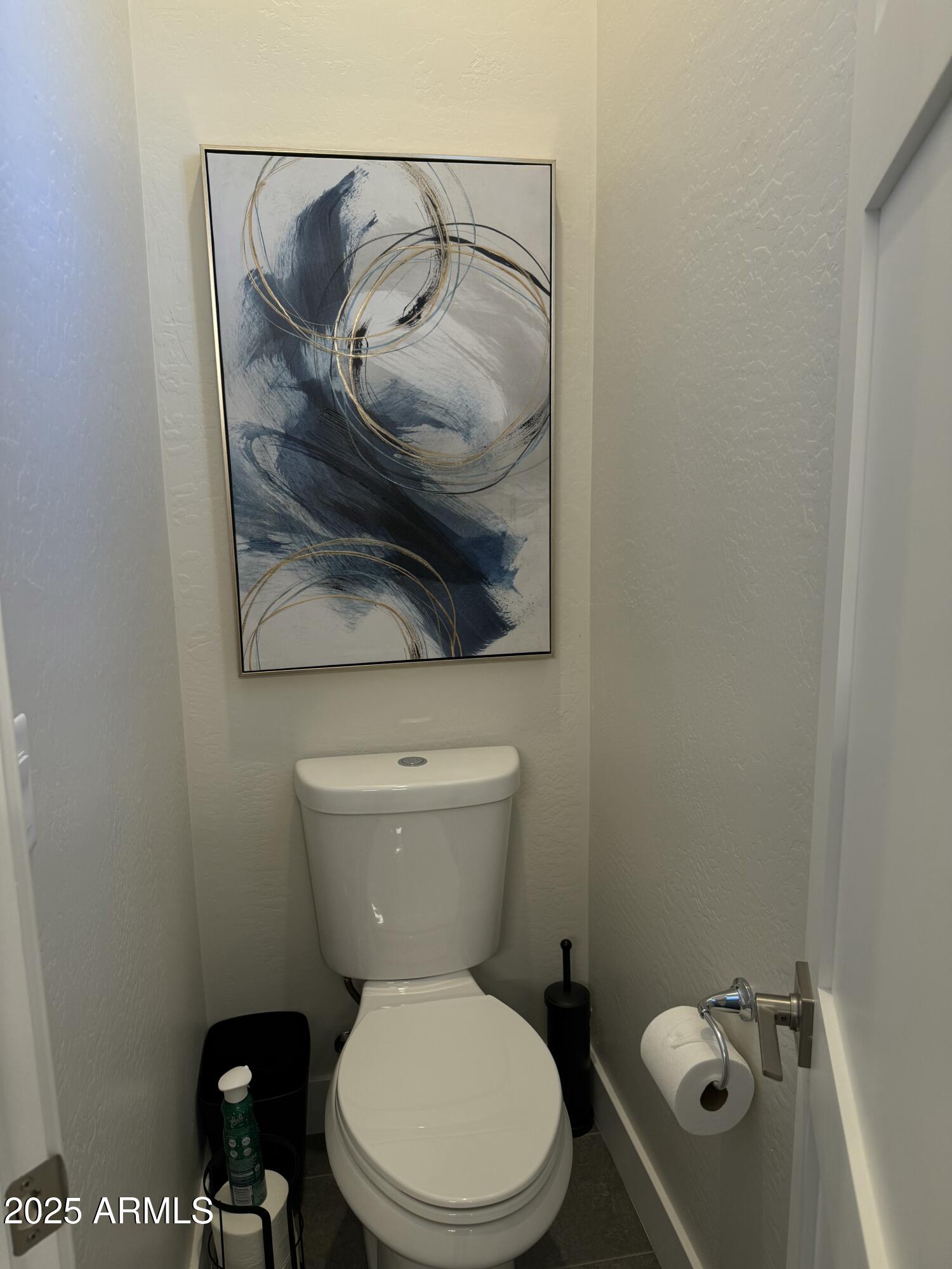 2007 East Rainbow Trail Payson, AZ 85541 - Photo 16 of 27 a white toilet sitting next to a shower curtain