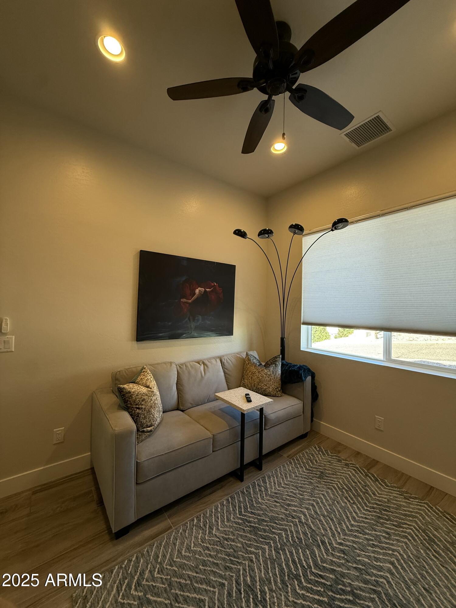 2007 East Rainbow Trail Payson, AZ 85541 - Photo 18 of 27 a living room with furniture and a rug
