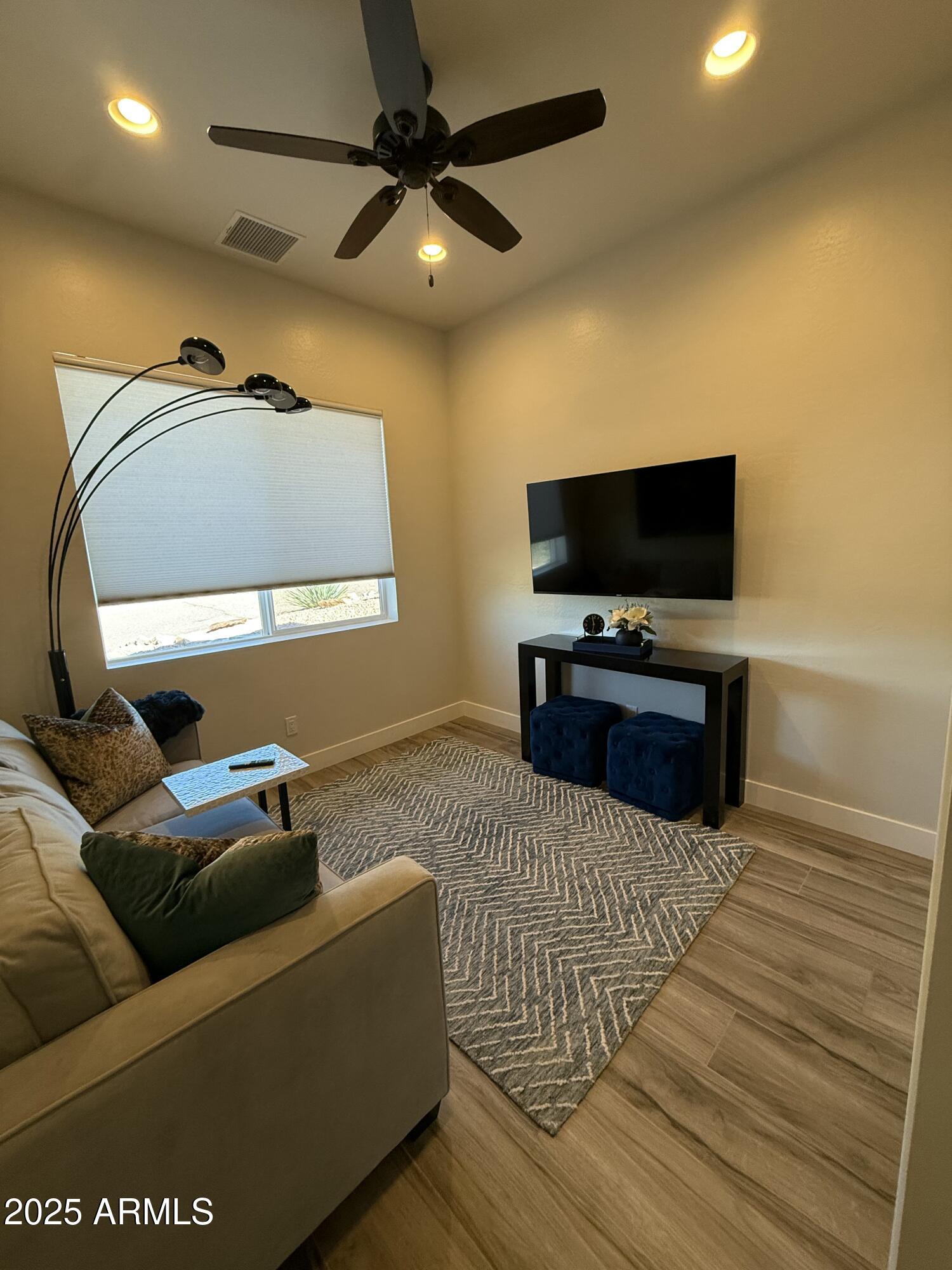 2007 East Rainbow Trail Payson, AZ 85541 - Photo 19 of 27 a living room with furniture and a flat screen tv