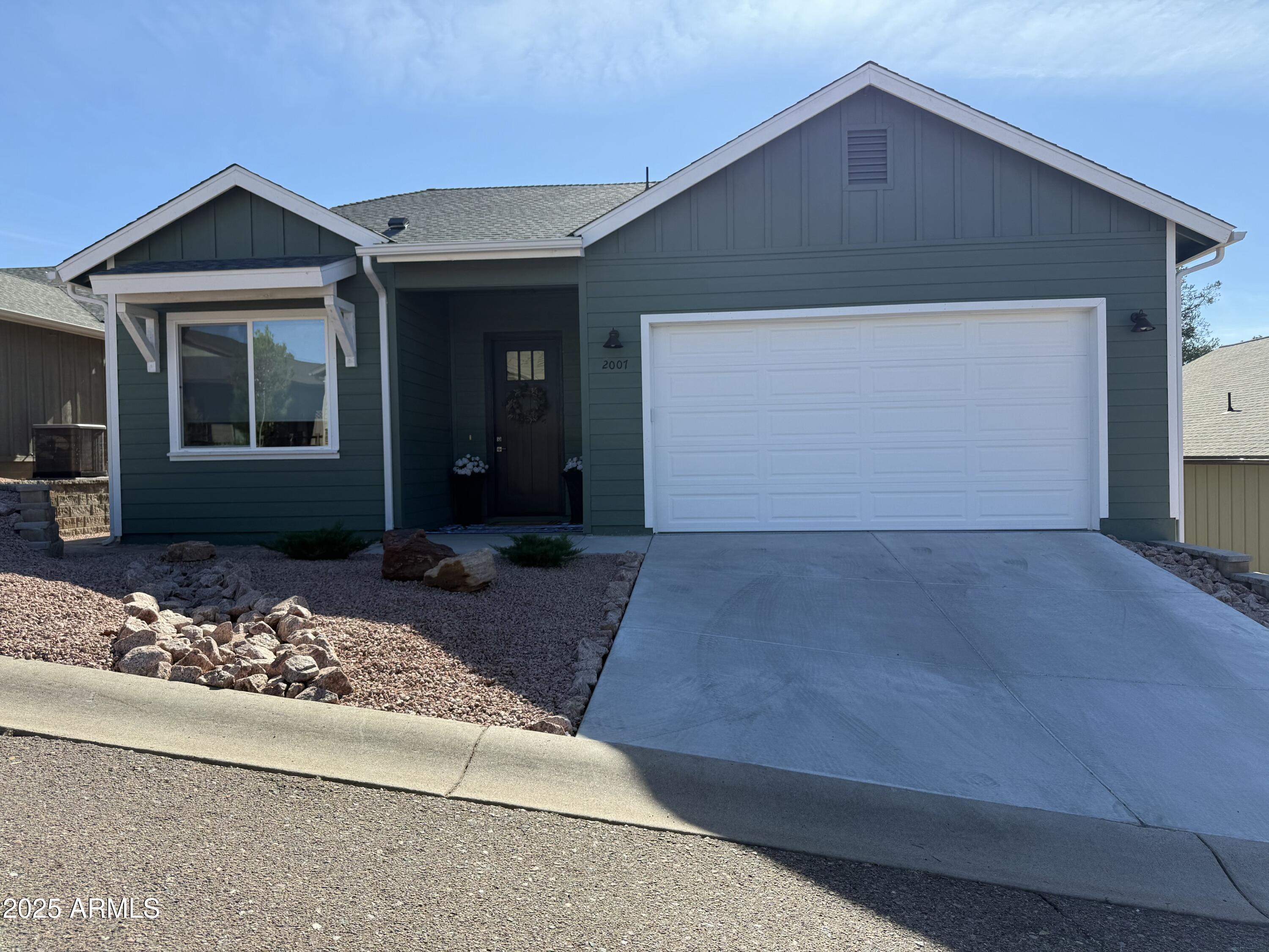 2007 East Rainbow Trail Payson, AZ 85541 - Photo 26 of 27 a front view of a house with garden