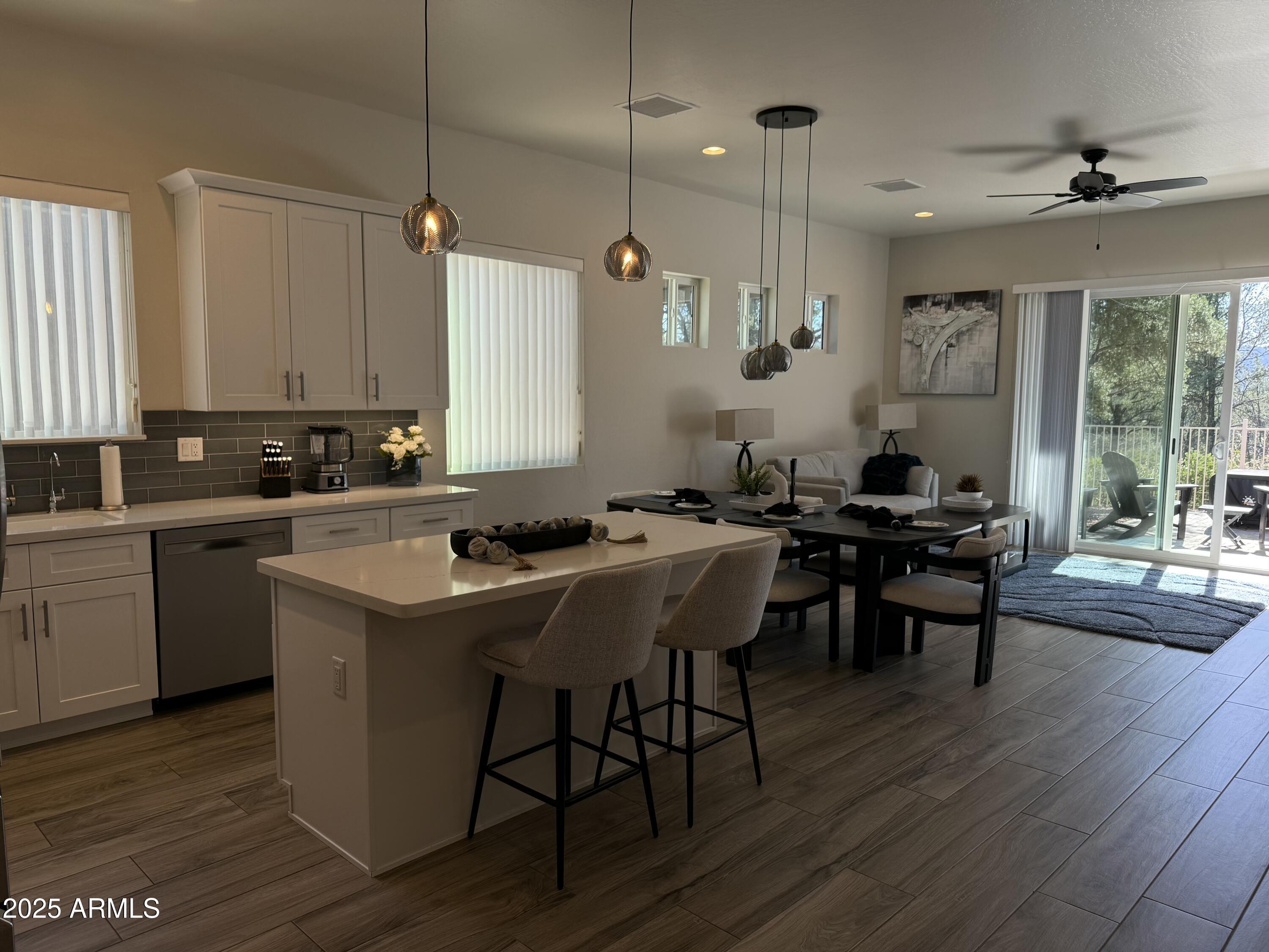 2007 East Rainbow Trail Payson, AZ 85541 - Photo 3 of 27 a kitchen with a sink stove and wooden floor