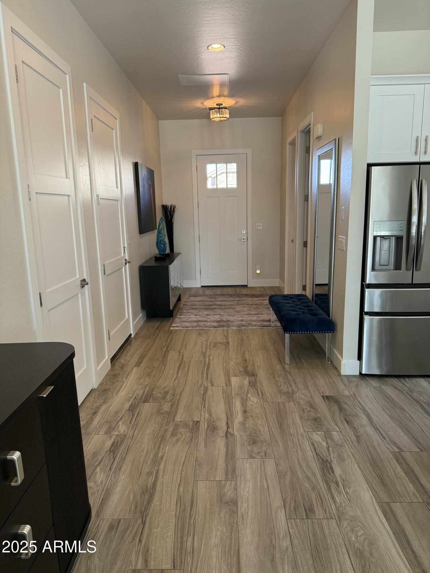 2007 East Rainbow Trail Payson, AZ 85541 - Photo 8 of 27 a kitchen with stainless steel appliances a refrigerator and wooden floor