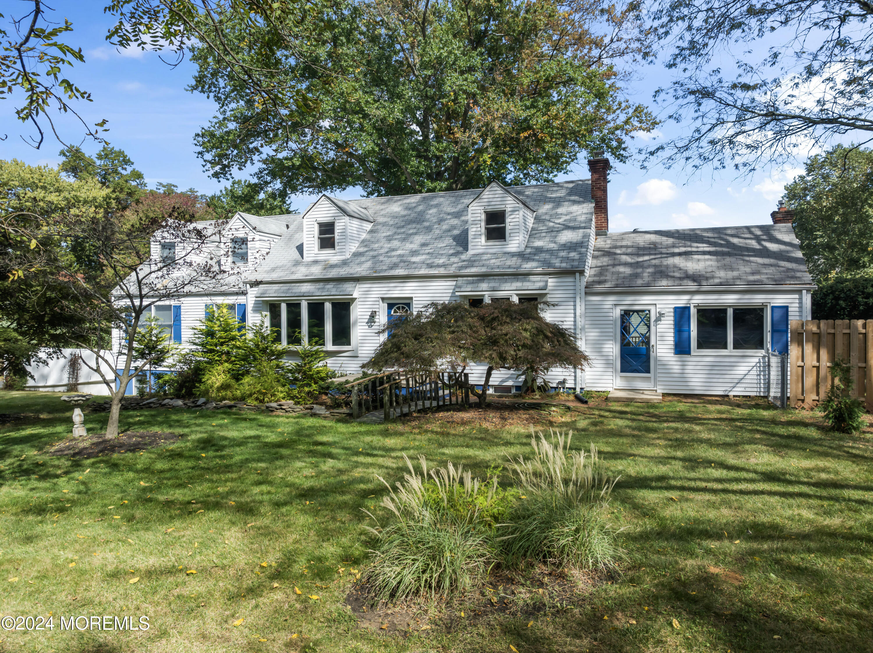 55 Swimming River Road Lincroft, NJ 07738 - Photo 3 of 51 a front view of a house with a yard