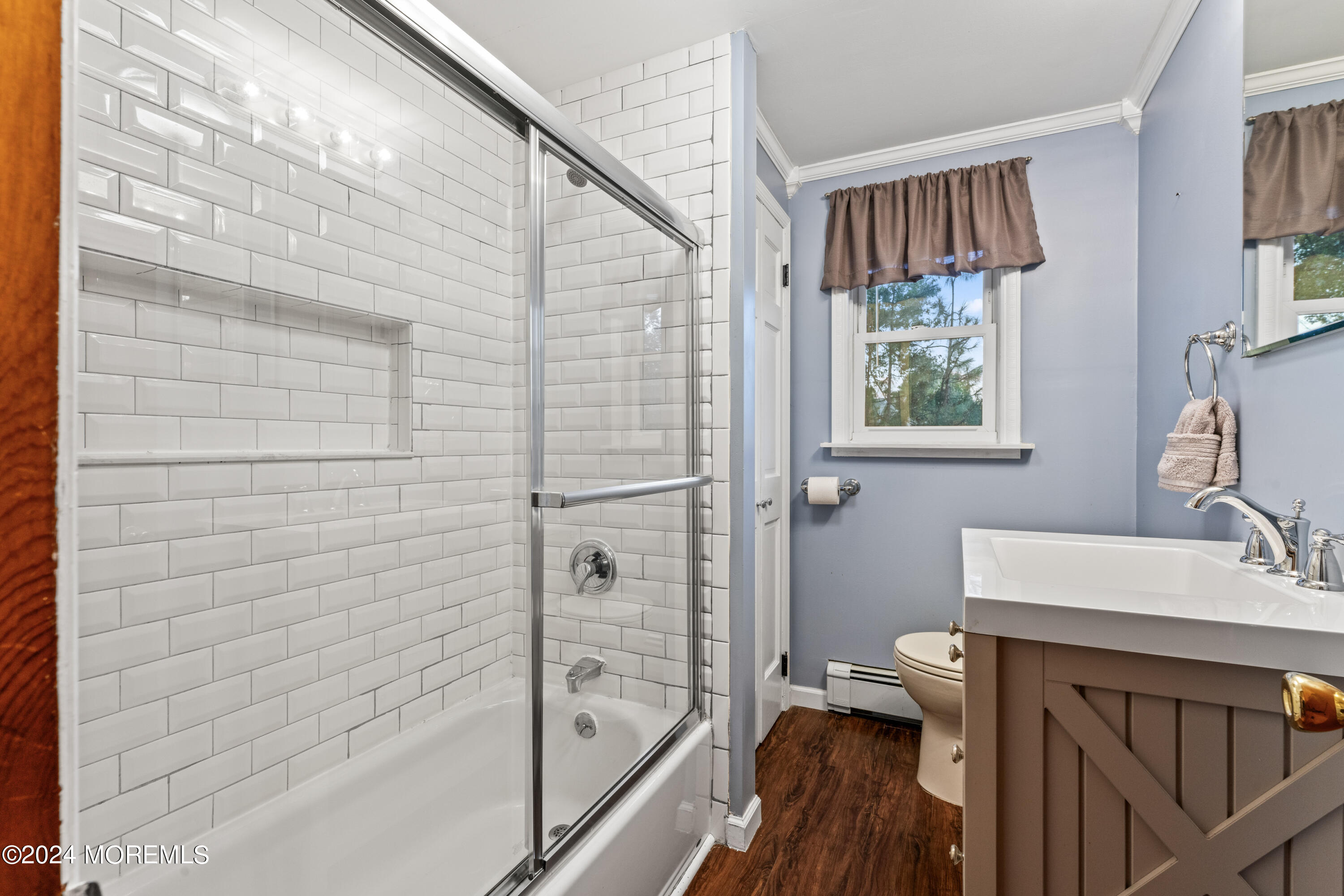 55 Swimming River Road Lincroft, NJ 07738 - Photo 32 of 51 a bathroom with a sink a toilet and shower