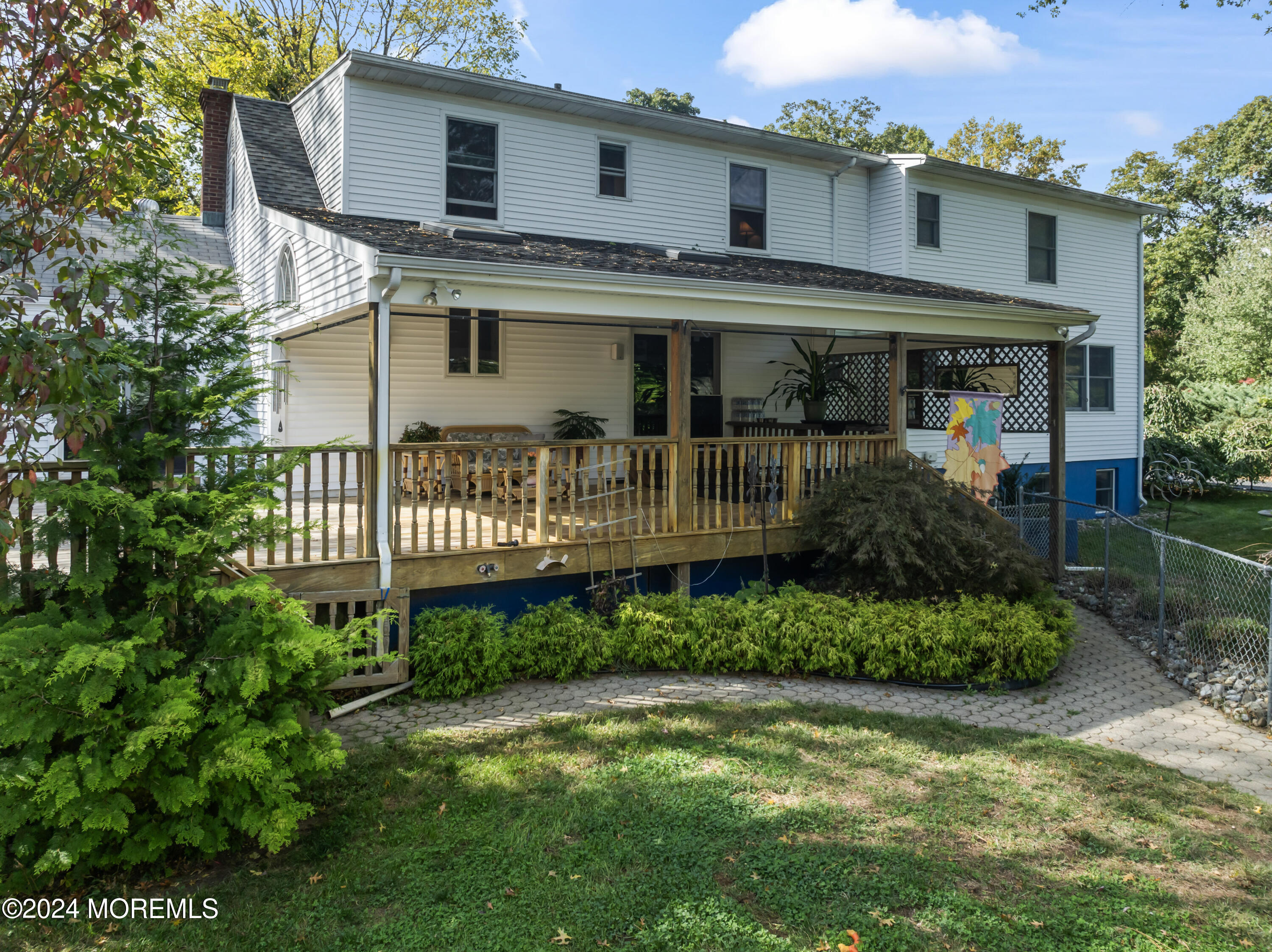 55 Swimming River Road Lincroft, NJ 07738 - Photo 42 of 51 a front view of a house with garden