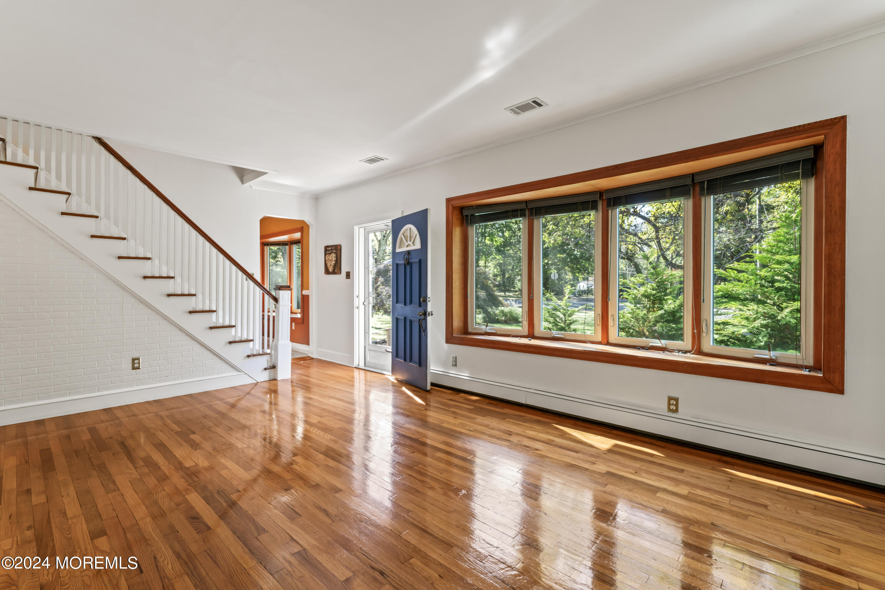 55 Swimming River Road Lincroft, NJ 07738 - Photo 5 of 51 a view of an entryway with wooden floor
