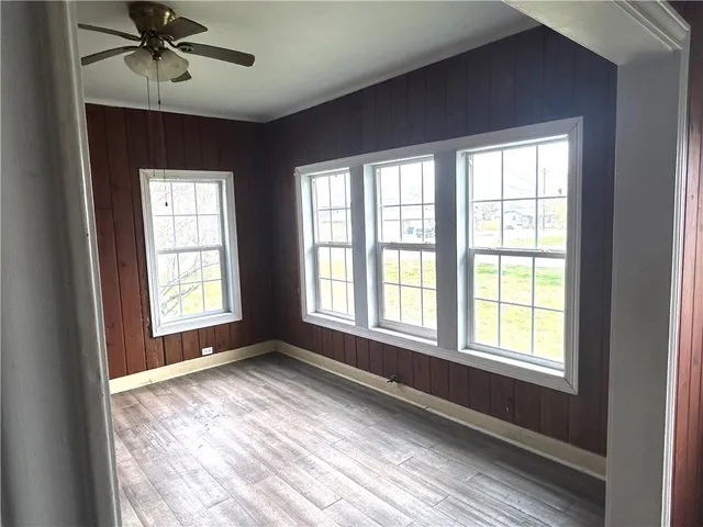 a kitchen with a sink appliances and cabinets
