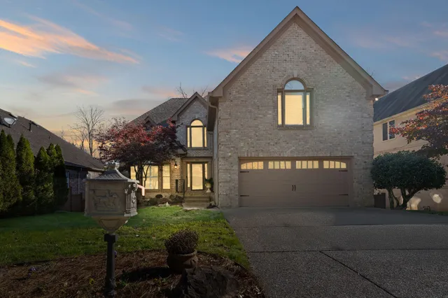 a view of backyard of a house