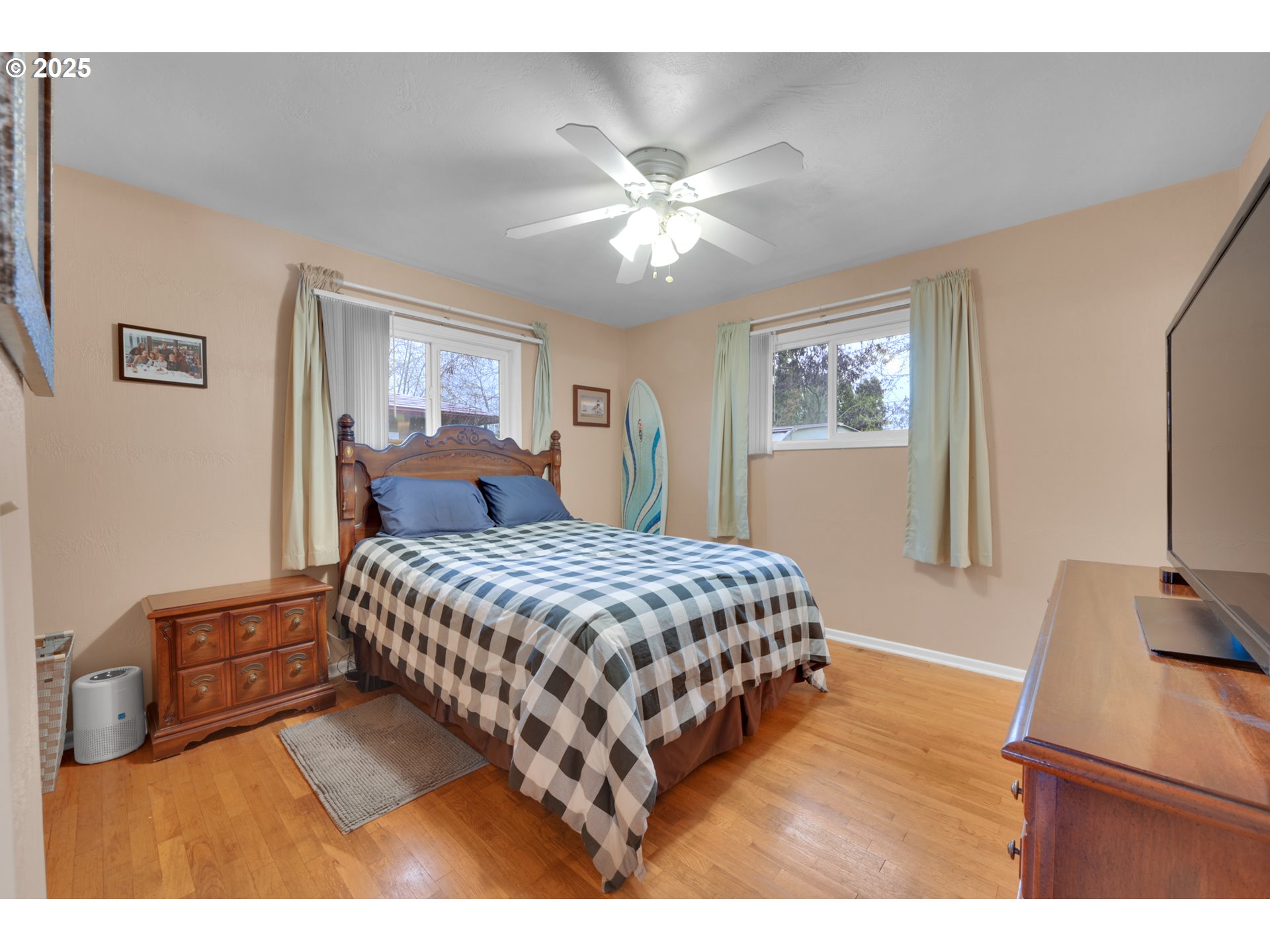 2617 Southeast Fulton Street Albany, OR 97322 - Photo 13 of 35 a bedroom with a bed window and a flat screen tv