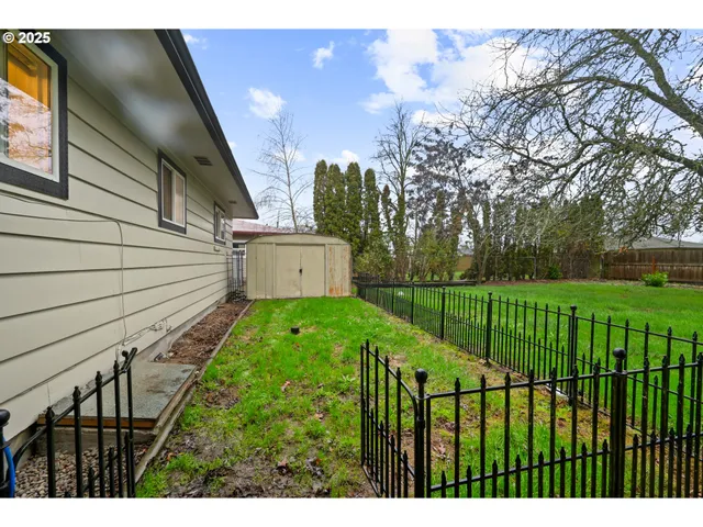 a view of a backyard with a garden