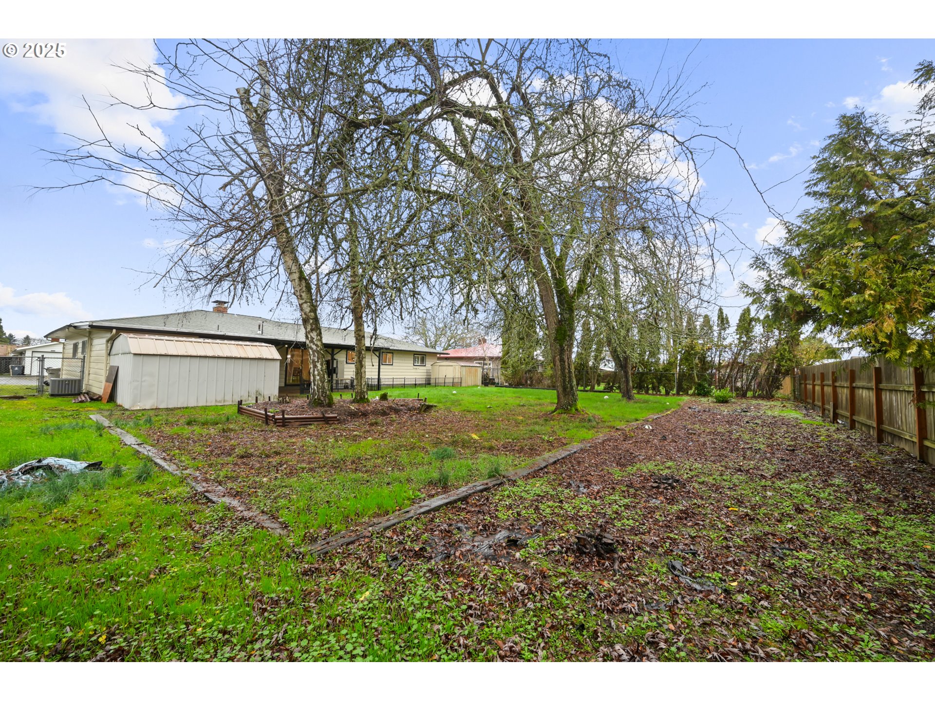 2617 Southeast Fulton Street Albany, OR 97322 - Photo 33 of 35 a view of backyard of house with green space