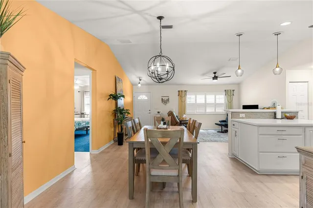 a view of dining table and chairs