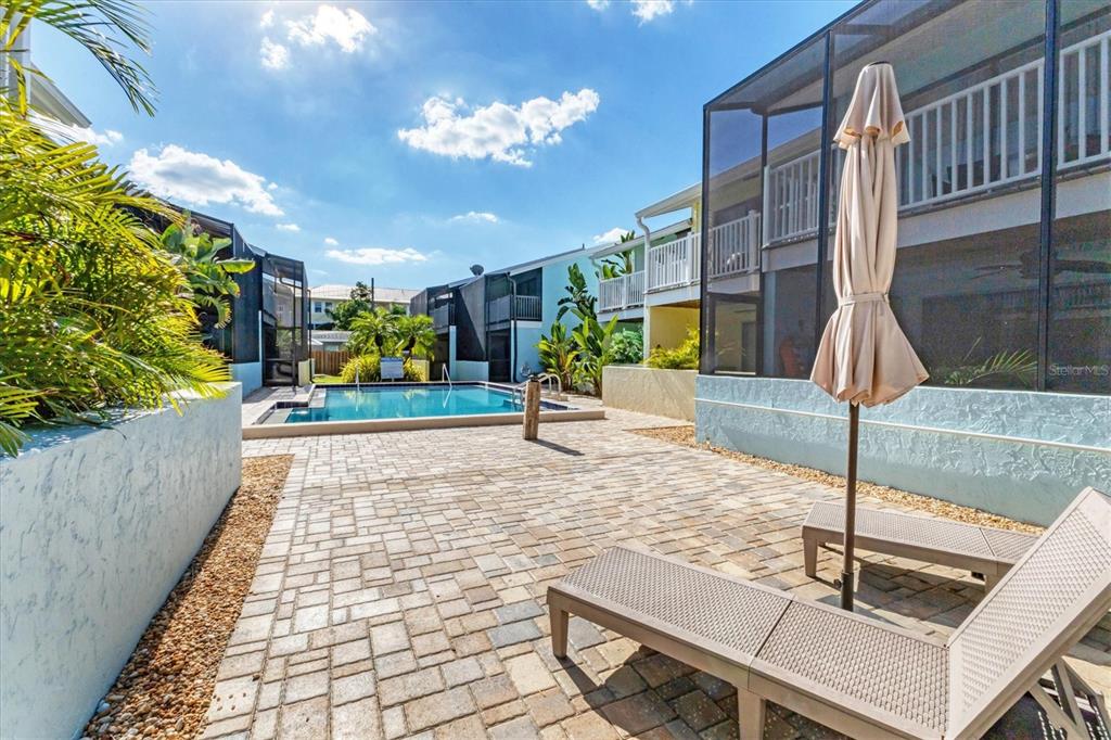 1762 Stickney Point Road, Unit 204 Sarasota, FL 34231 - Photo 33 of 38 a view of a hall with couches