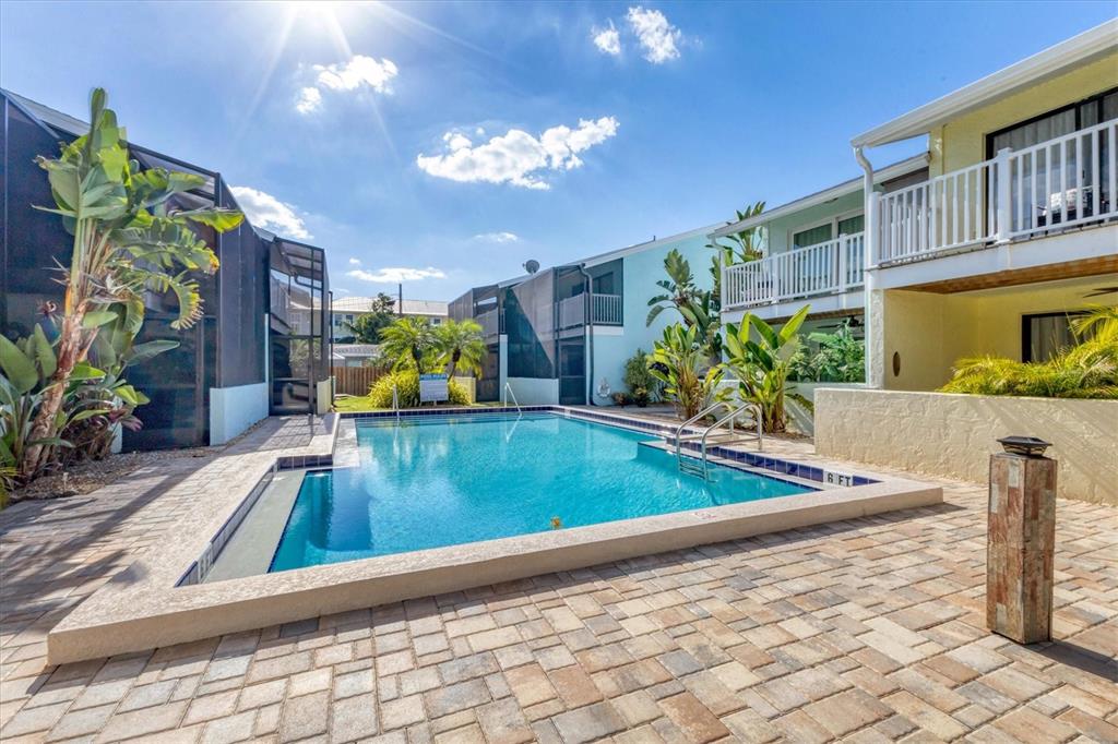 1762 Stickney Point Road, Unit 204 Sarasota, FL 34231 - Photo 34 of 38 a view of a living room and kitchen