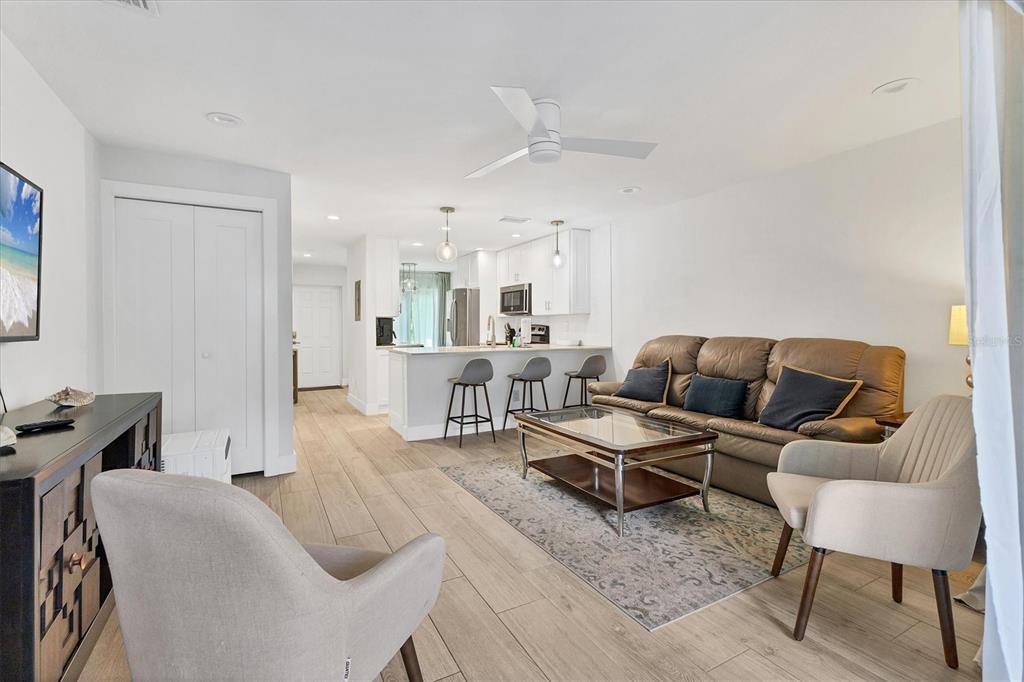 1762 Stickney Point Road, Unit 204 Sarasota, FL 34231 - Photo 9 of 38 a living room with furniture and a couch