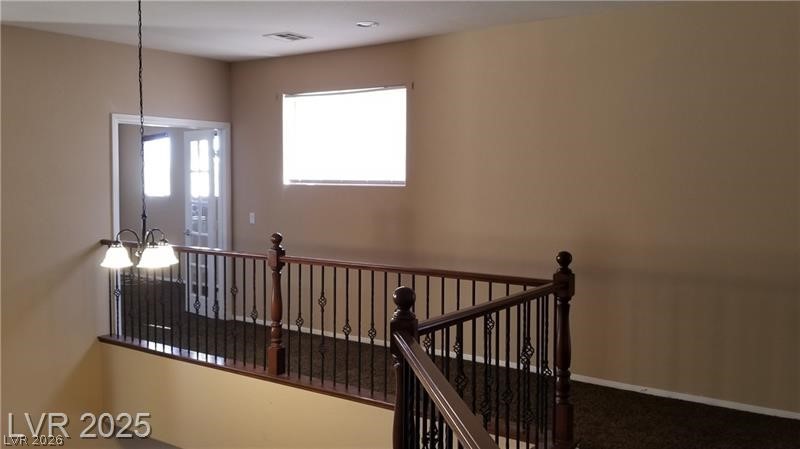7414 Page Ranch Court Las Vegas, NV 89131 - Photo 14 of 36 Staircase with carpet floors and baseboards