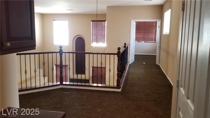 7414 Page Ranch Court Las Vegas, NV 89131 - Photo 29 of 36 Hallway featuring carpet flooring