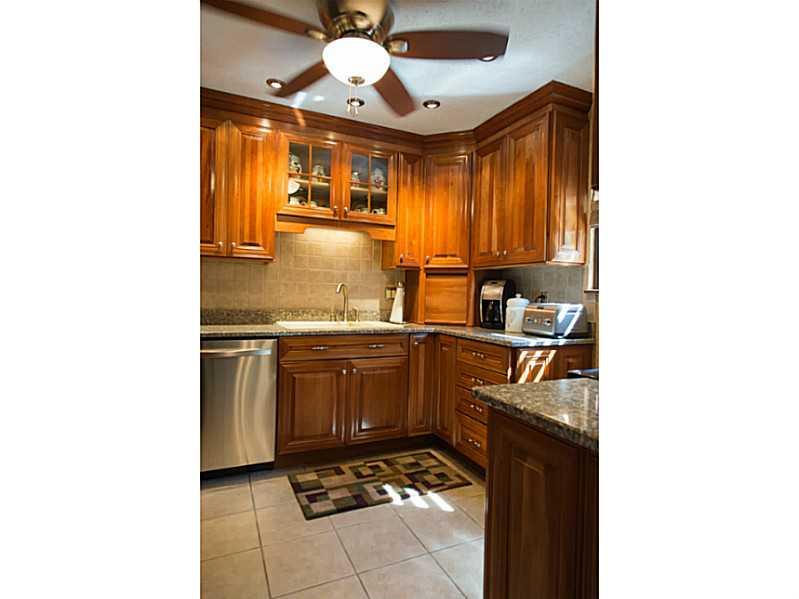 4773 Bayfield Road Allison Park, PA 15101 - Photo 6 of 22 Kitchen. Cabinetry has pull-outs. Under cabinet TV included.