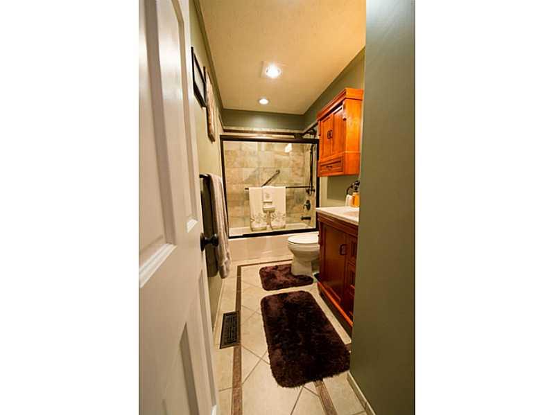 4773 Bayfield Road Allison Park, PA 15101 - Photo 10 of 22 Full Bath. Marble top vanity, heat lamp with timer, ceramic tile surround and floor.