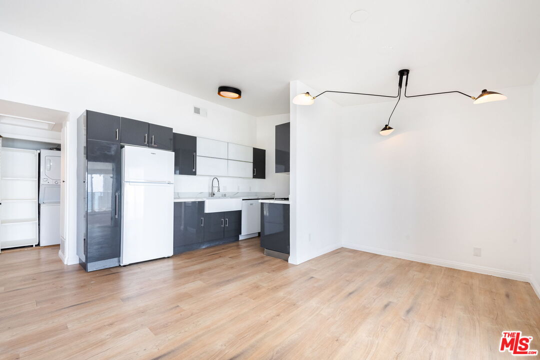 20644 Pacific Coast Highway Malibu, CA 90265 - Photo 16 of 32 a kitchen with stainless steel appliances a refrigerator and a sink
