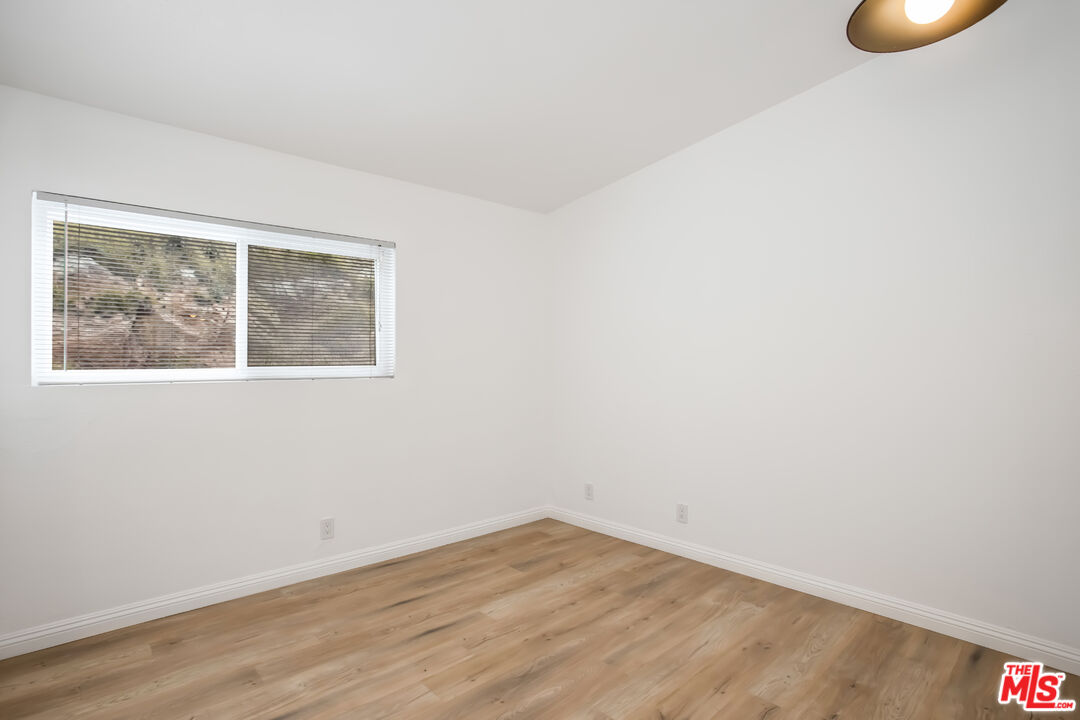 20644 Pacific Coast Highway Malibu, CA 90265 - Photo 22 of 32 an empty room with a window