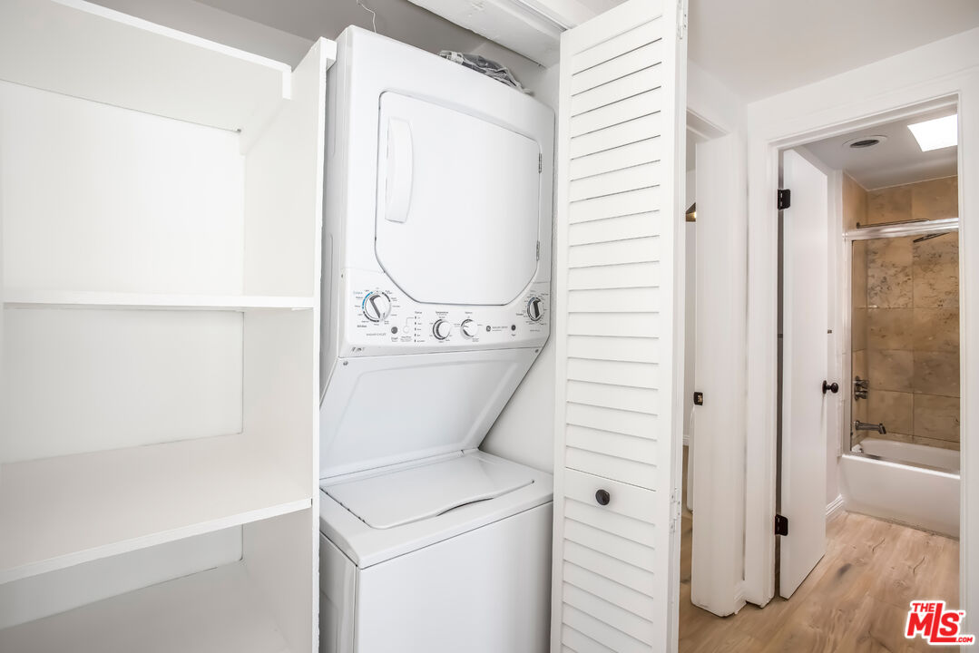20644 Pacific Coast Highway Malibu, CA 90265 - Photo 23 of 32 a utility room with dryer and washer