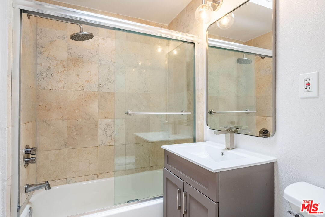 20644 Pacific Coast Highway Malibu, CA 90265 - Photo 28 of 32 a bathroom with a sink mirror and shower