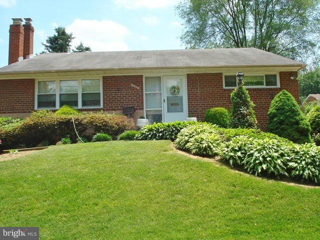 3714 Leverton Street Silver Spring, MD 20906 - Photo 2 of 24 front view of a house with a yard