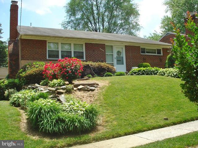 3714 Leverton Street Silver Spring, MD 20906 - Photo 3 of 24 a front view of house with garden and porch