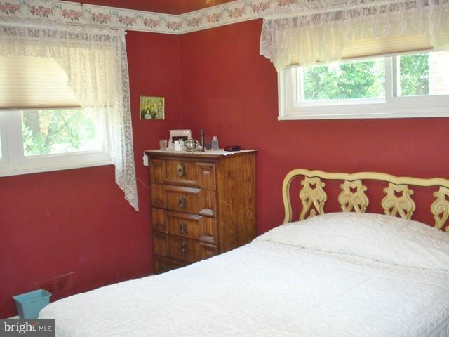 3714 Leverton Street Silver Spring, MD 20906 - Photo 7 of 24 a bedroom with a bed and a window