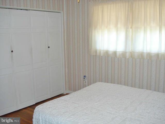 3714 Leverton Street Silver Spring, MD 20906 - Photo 8 of 24 a bedroom with a bed and a window