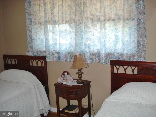 3714 Leverton Street Silver Spring, MD 20906 - Photo 10 of 24 a bedroom with a bed and a window
