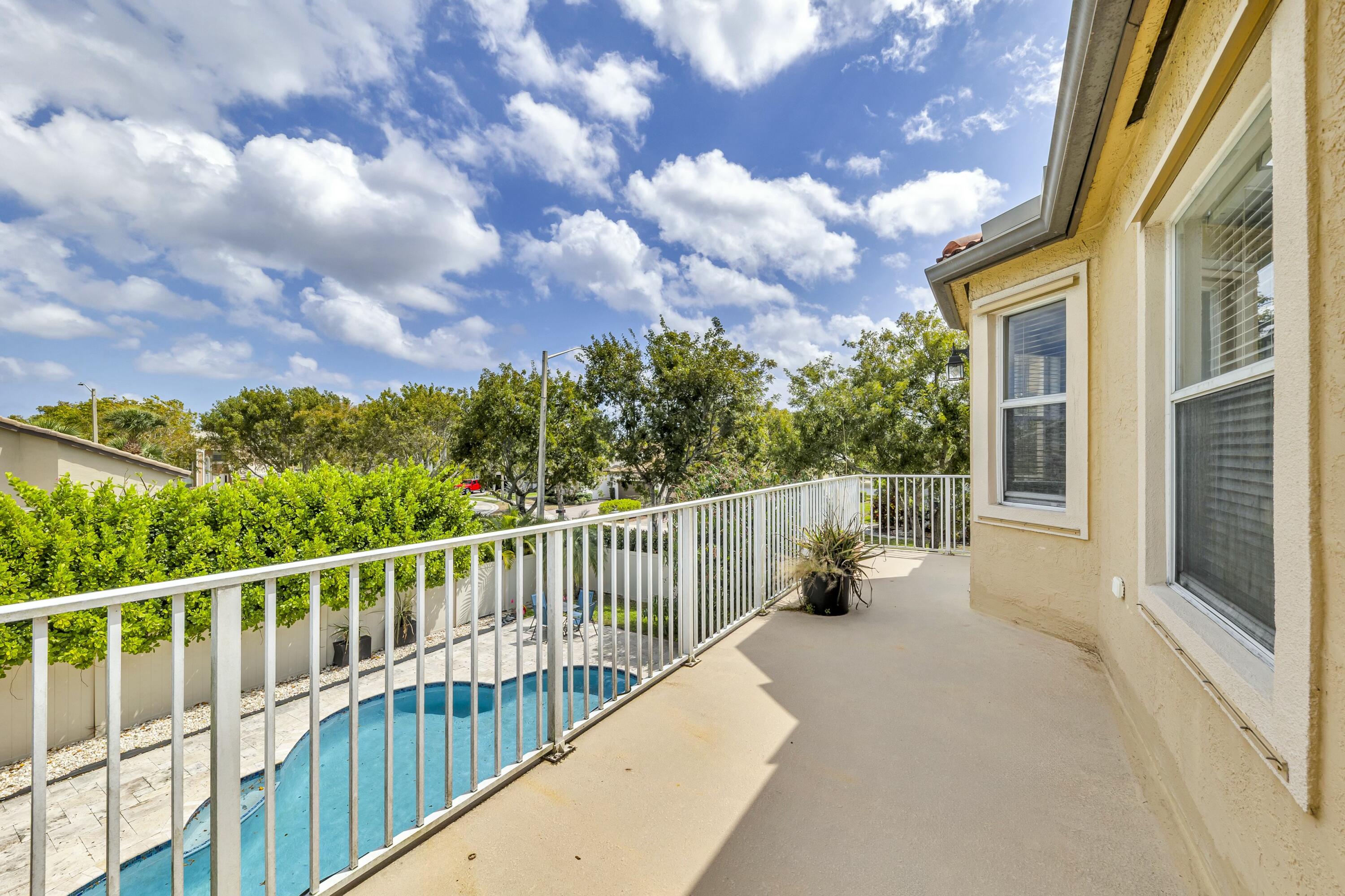 9895 Shepard Place Wellington, FL 33414 - Photo 42 of 60 a view of a two chair in the balcony
