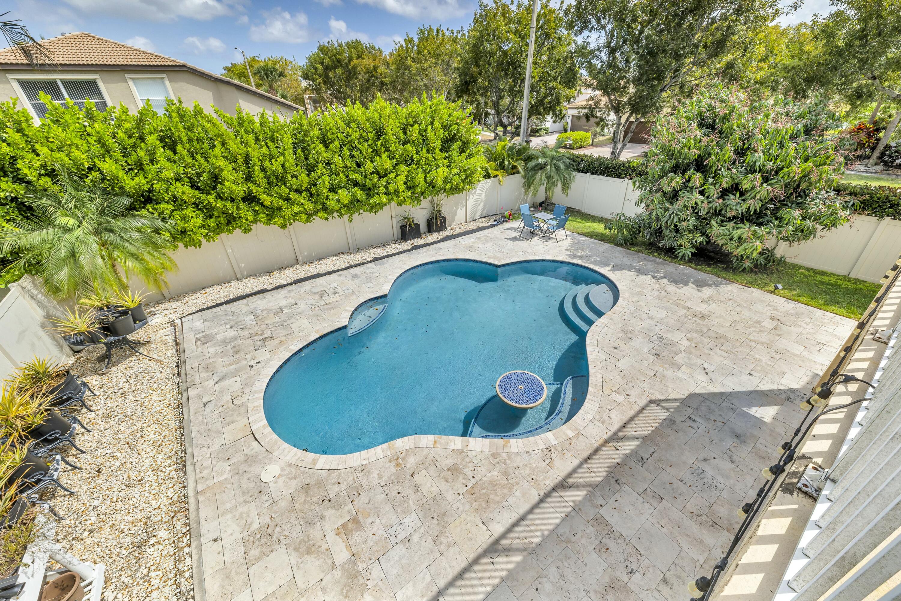 9895 Shepard Place Wellington, FL 33414 - Photo 43 of 60 a view of outdoor space and yard