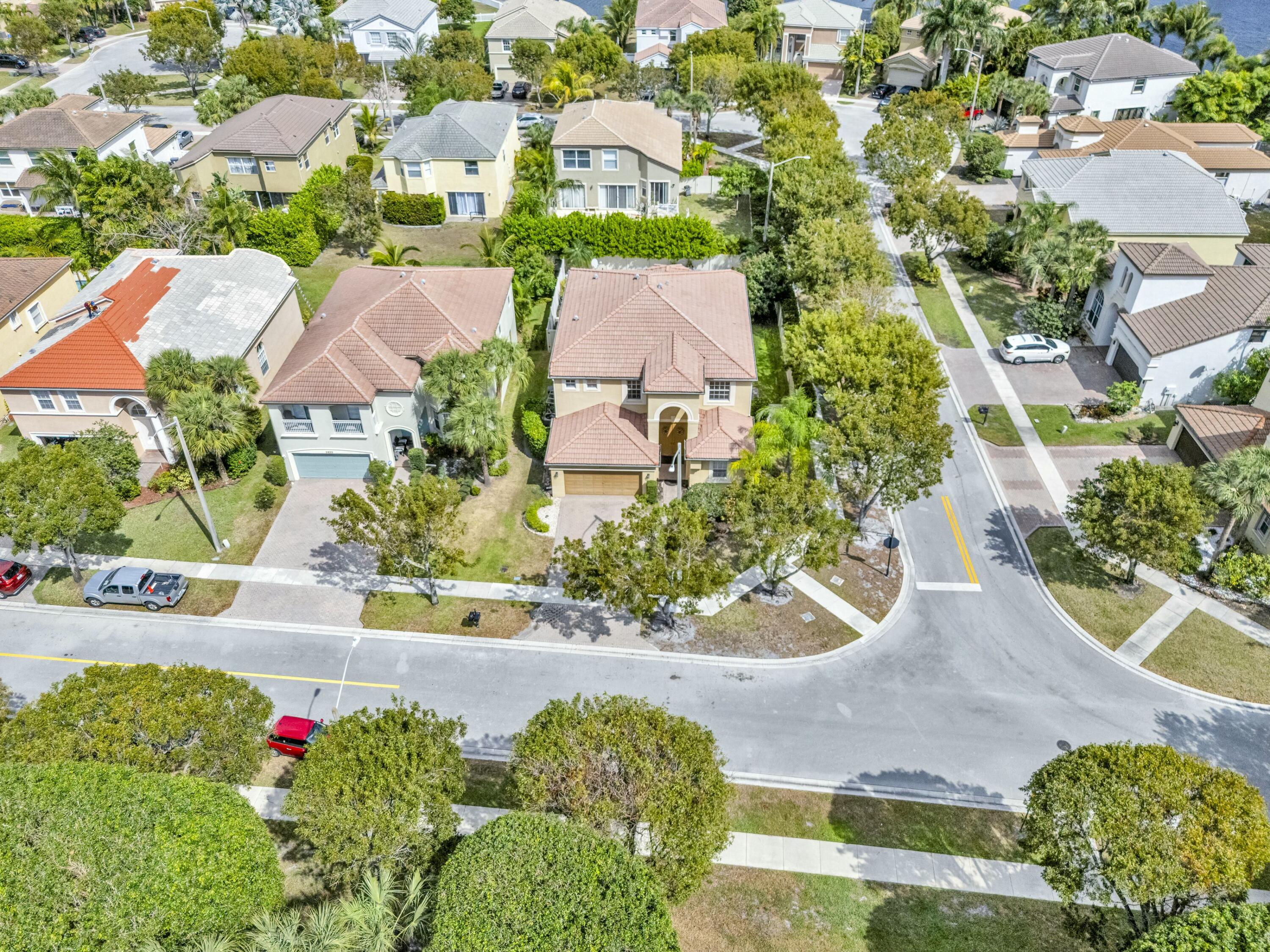 9895 Shepard Place Wellington, FL 33414 - Photo 51 of 60 an aerial view of multiple house