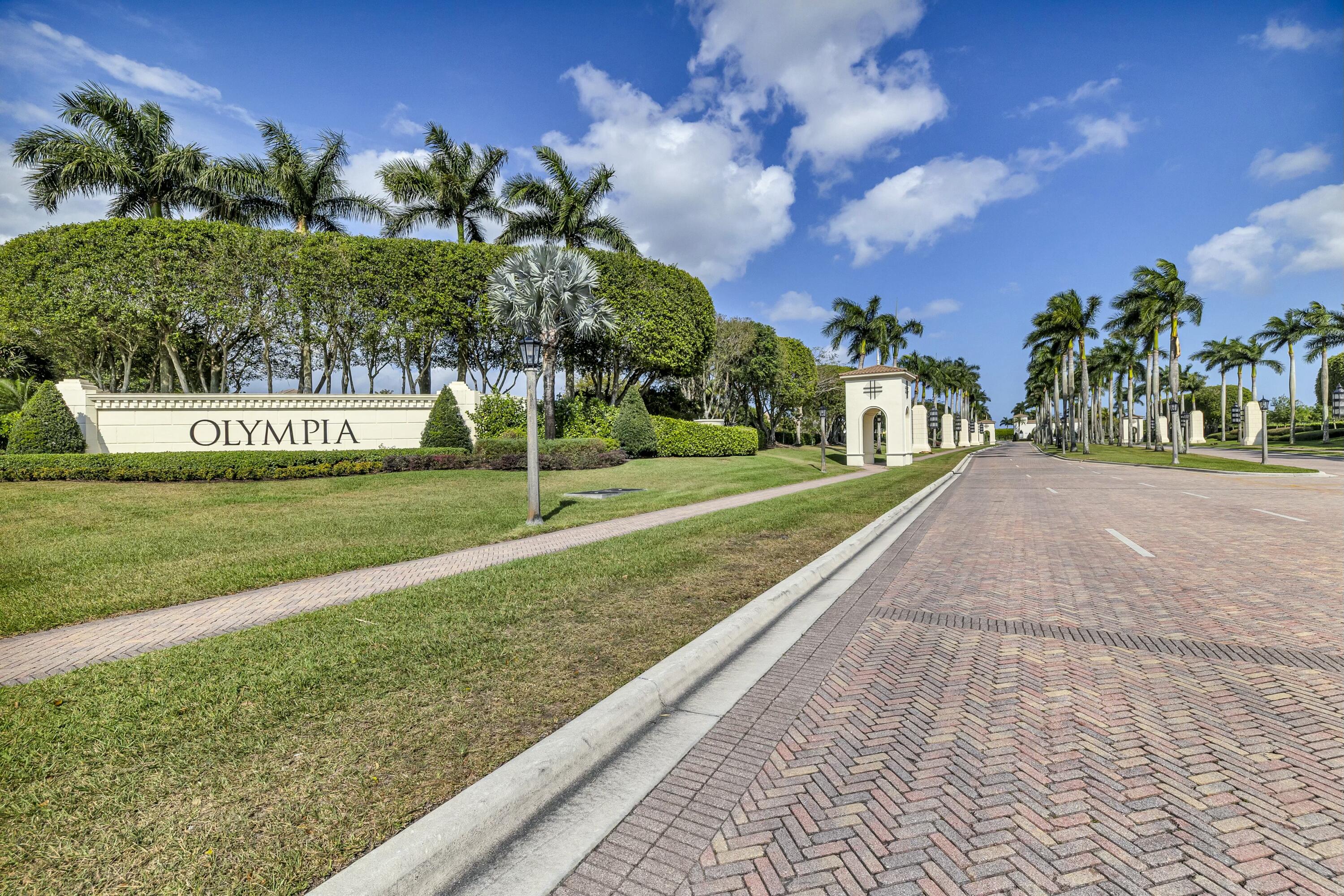 9895 Shepard Place Wellington, FL 33414 - Photo 55 of 60 a view of a park with swings and slides