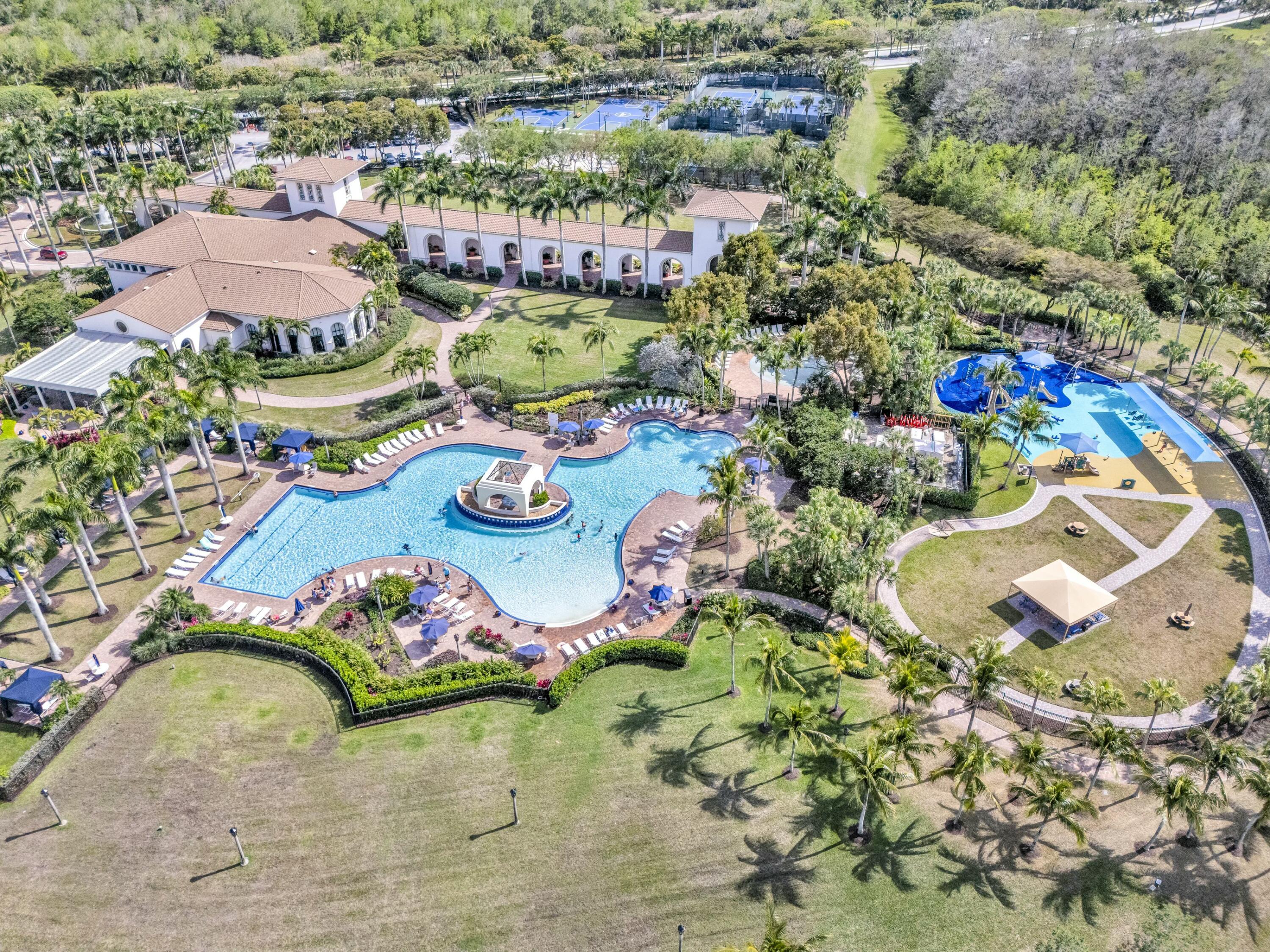 9895 Shepard Place Wellington, FL 33414 - Photo 56 of 60 an aerial view of a swimming pool yard and mountain view in back
