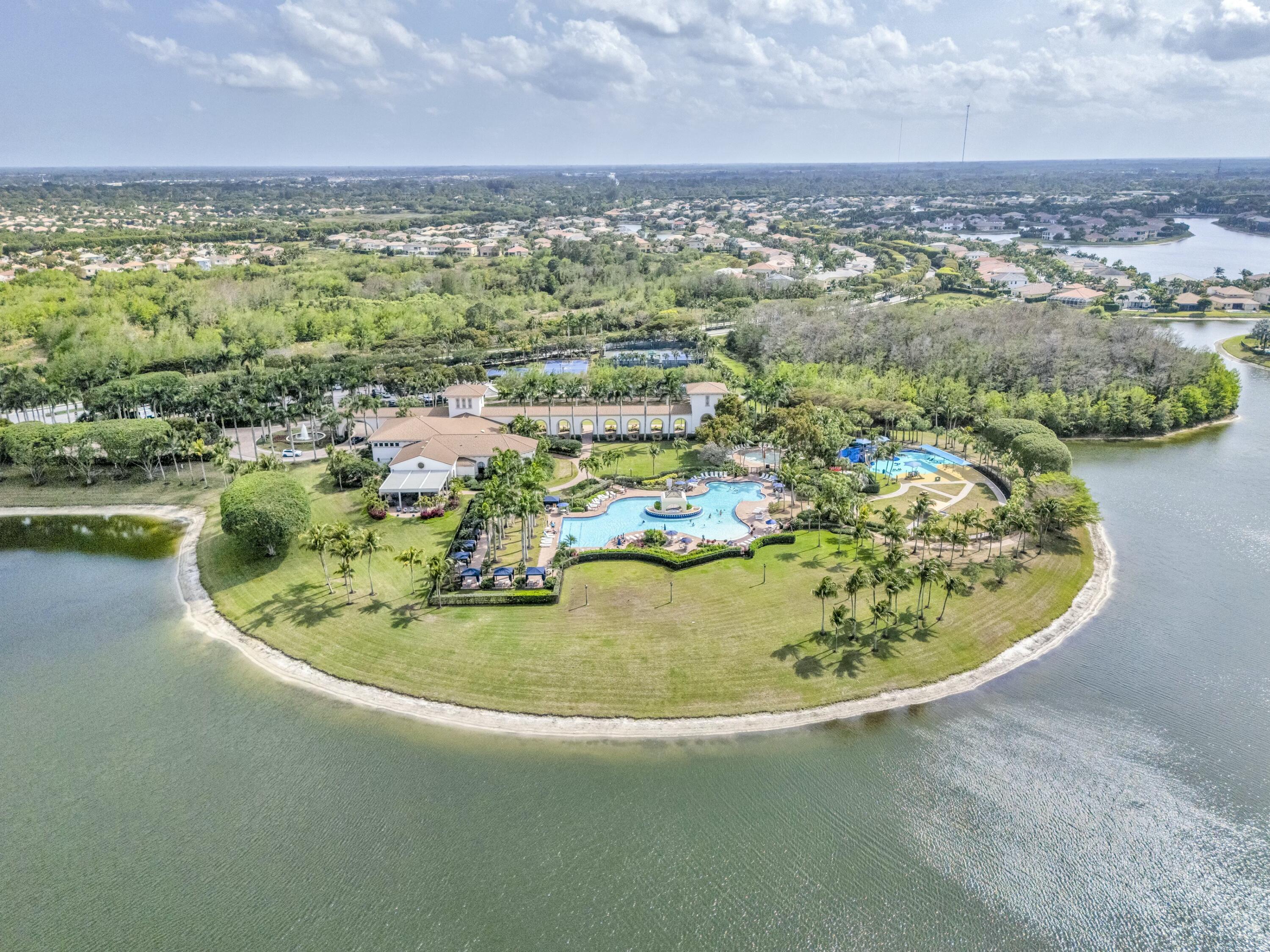 9895 Shepard Place Wellington, FL 33414 - Photo 58 of 60 an aerial view of a house with a lake view
