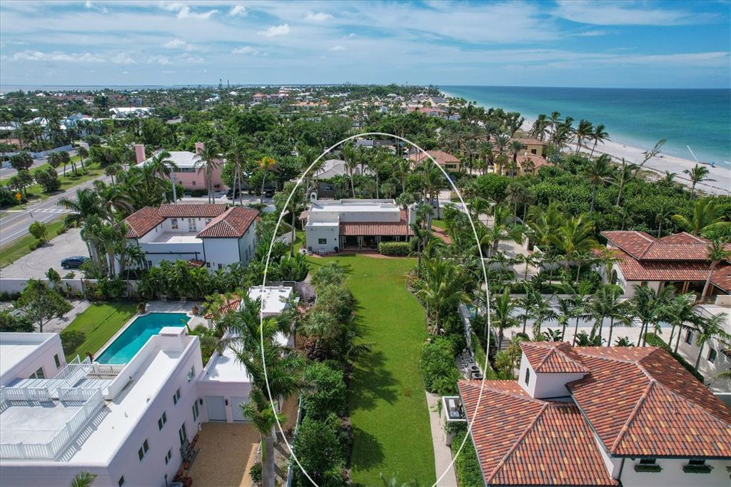 1021 10th Street West Boca Grande, FL 33921 - Photo 24 of 34 an aerial view of a house with a garden