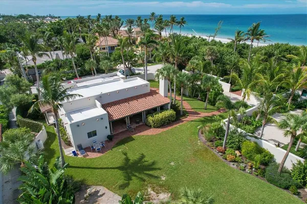 an aerial view of a house with a garden