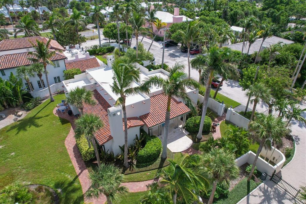 1021 10th Street West Boca Grande, FL 33921 - Photo 34 of 34 an aerial view of multiple houses with yard