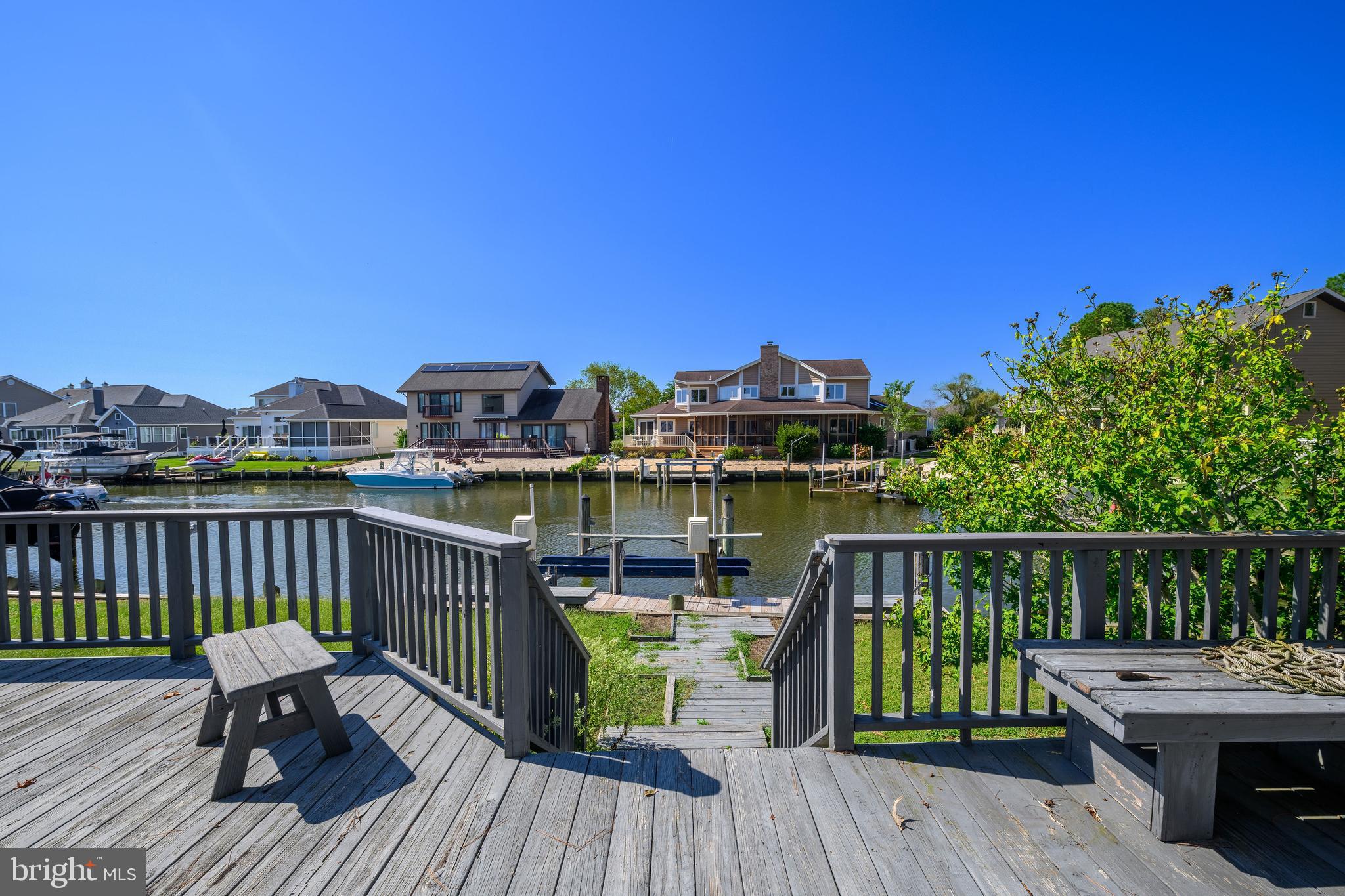 6 Ebb Tide Berlin, MD 21811 - Photo 14 of 53 a view of a balcony with two chairs and a deck