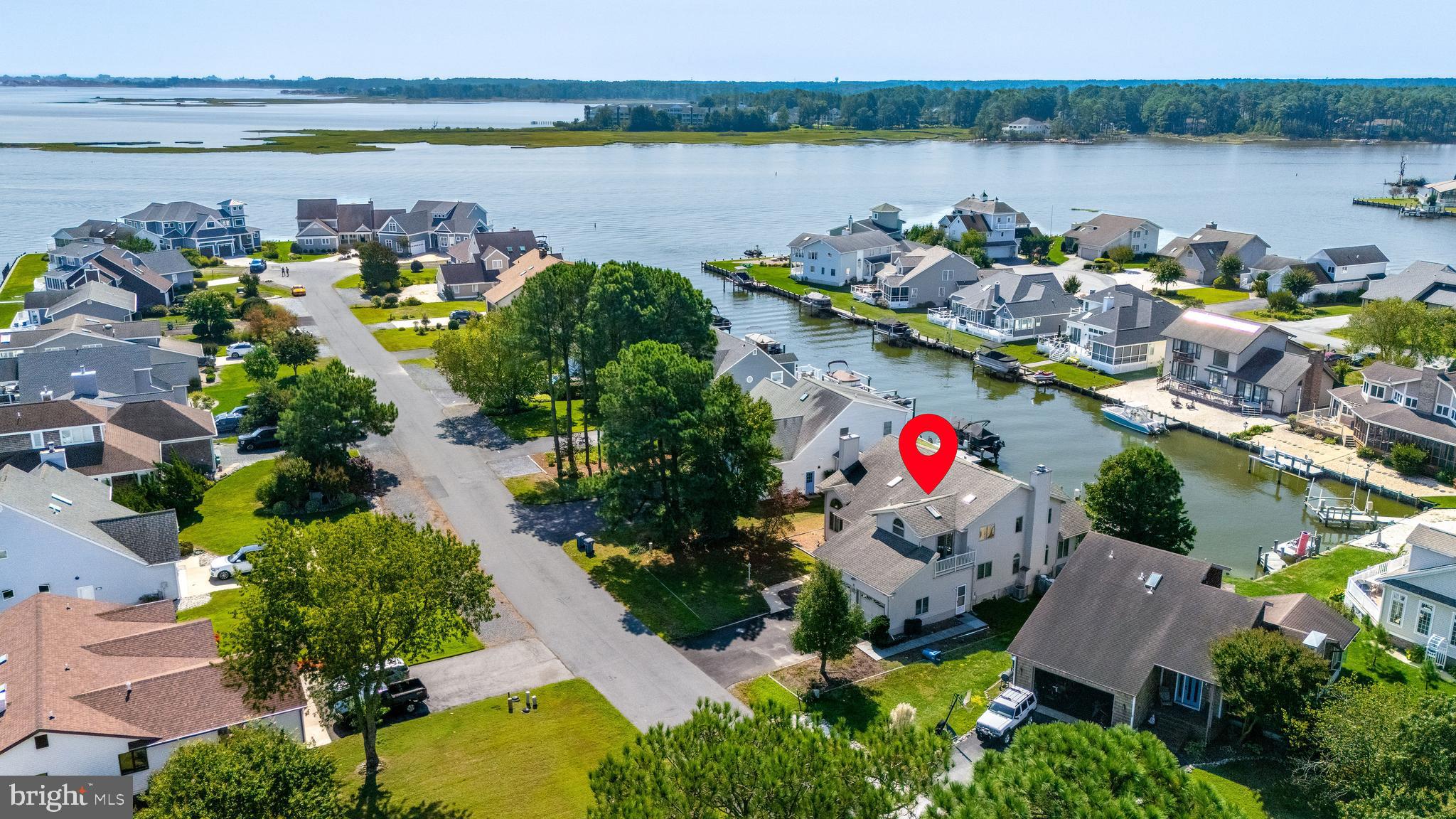 6 Ebb Tide Berlin, MD 21811 - Photo 19 of 53 an aerial view of a house with a lake and a mountain view