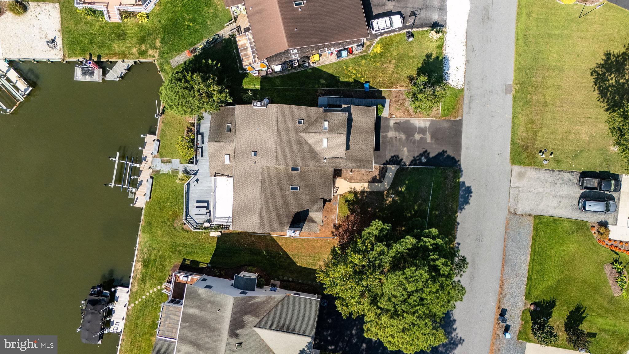 6 Ebb Tide Berlin, MD 21811 - Photo 2 of 53 an aerial view of a house with a yard basket ball court and outdoor seating