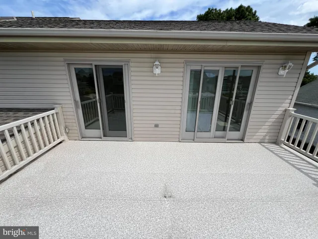 a spacious bathroom with a sink a toilet and shower