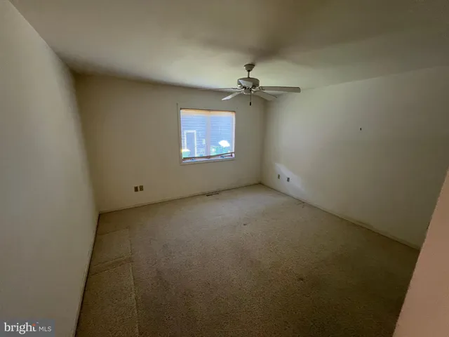 a view of a garage with rack on the wall