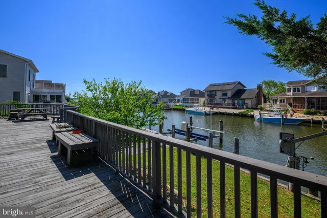 a view of a balcony with chairs